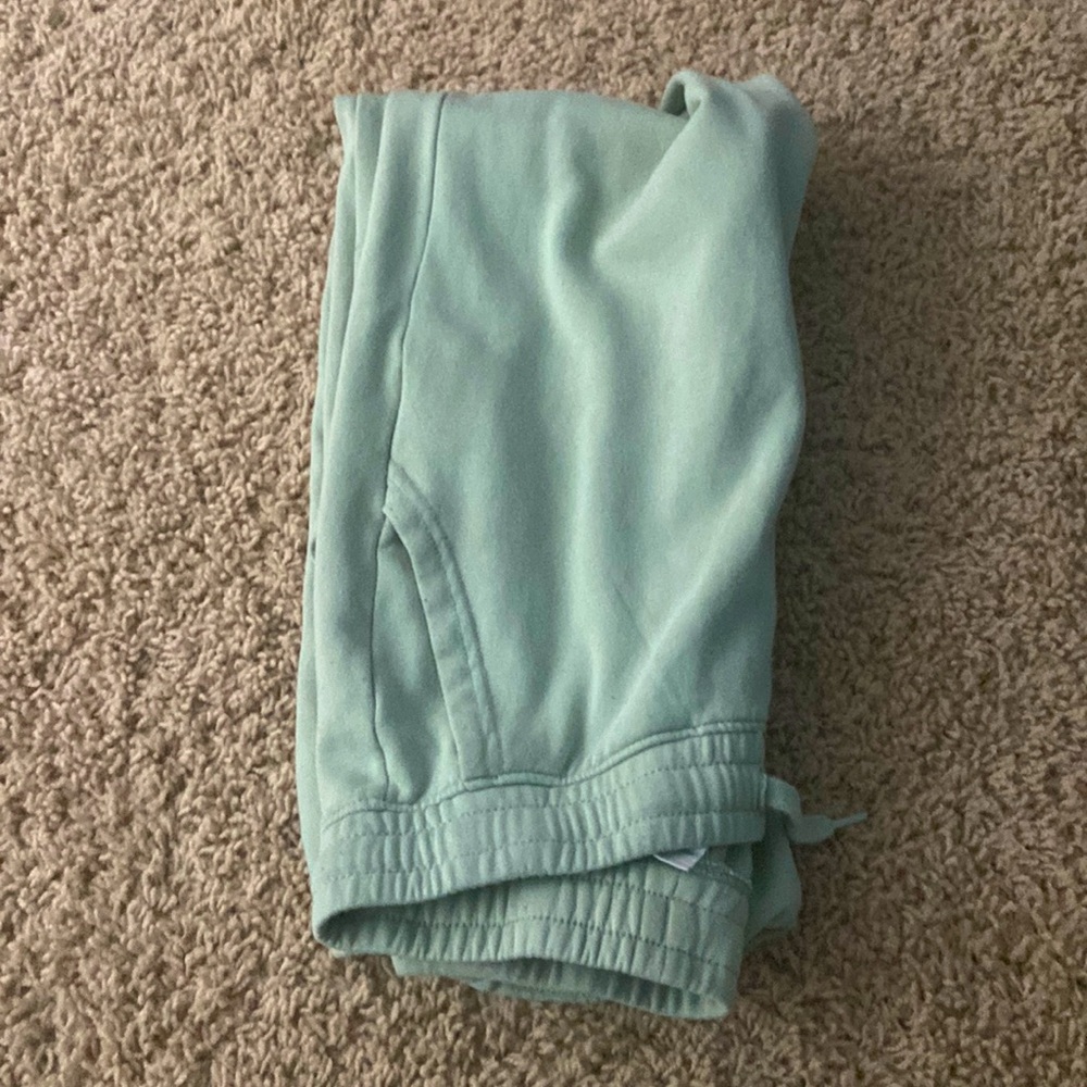 green sweatpants